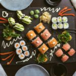 Japanese Birthday - sushi on black ceramic plate