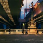 Japanese Summer - a group of people walking across a bridge