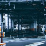 Japanese Railroad - a train station with a train on the tracks