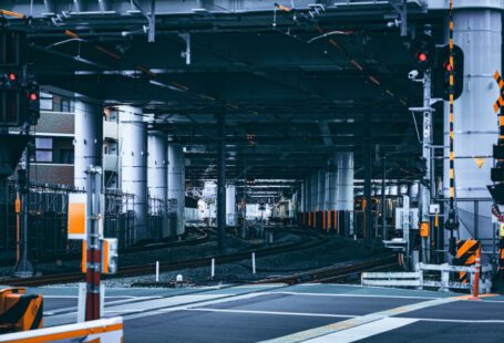 Japanese Railroad - a train station with a train on the tracks