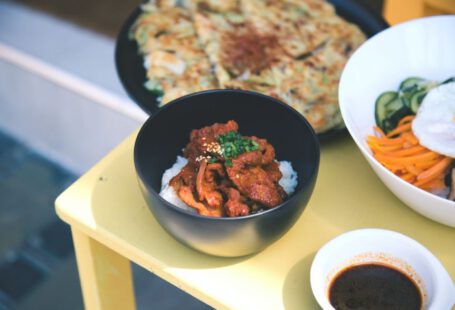 Japanese Dishes - a yellow table topped with bowls of food