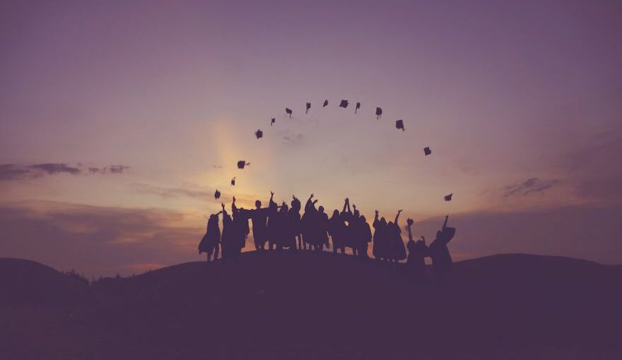 Japanese Education - silhouette of people standing on hill