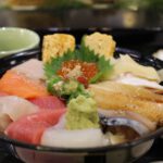 Japanese Stocks - raw meat in black bowl