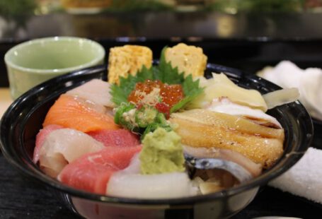 Japanese Stocks - raw meat in black bowl