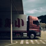 Japanese Companies - box truck passing through toll gate