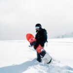 Ski In Japan - person holding snowboard