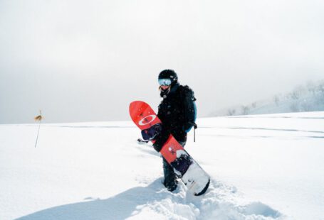 Ski In Japan - person holding snowboard