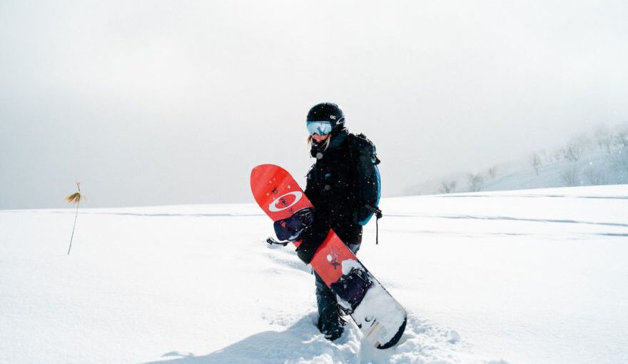 Ski In Japan - person holding snowboard