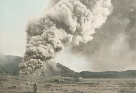 Japan History - grayscale photo of standing person facing on smoke