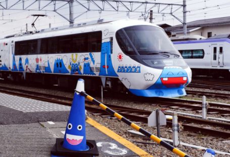 Japanese Train - white and blue train on rail tracks