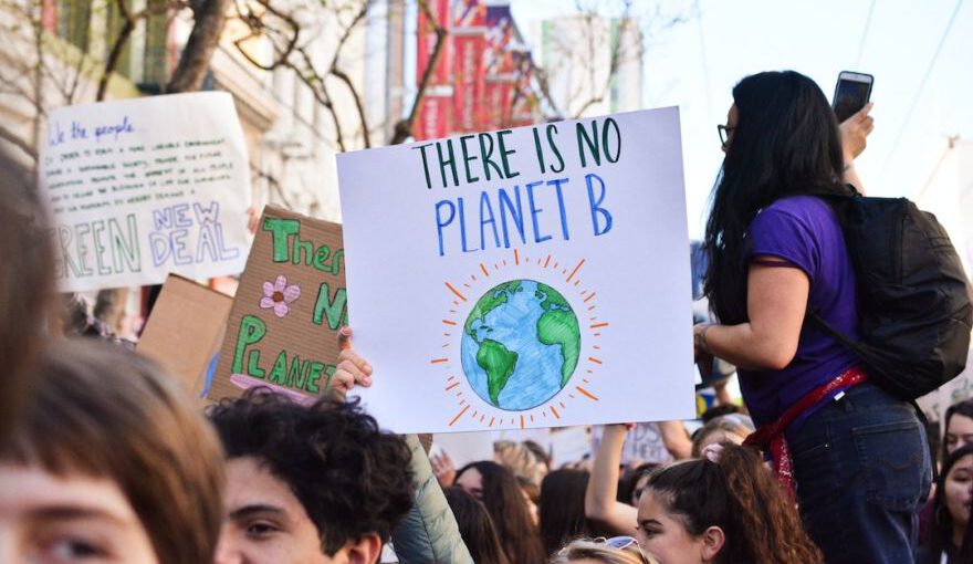 Climate - person holding there is no planet b poster