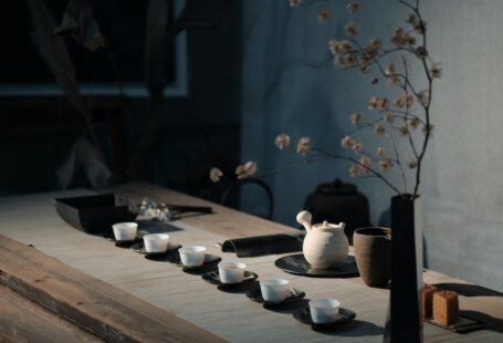 Japanese Tea Ceremony - white flowers on black ceramic vase