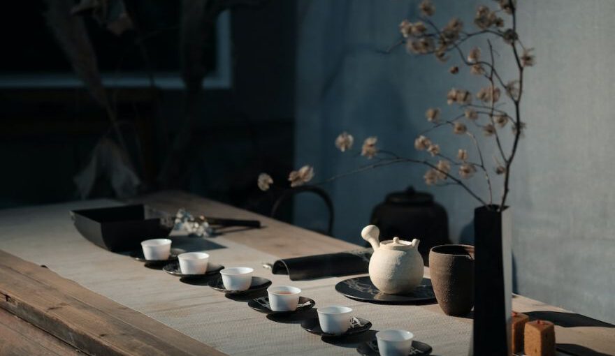 Japanese Tea Ceremony - white flowers on black ceramic vase