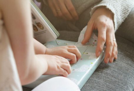 Gift-giving Japan - persons hand on white laptop computer