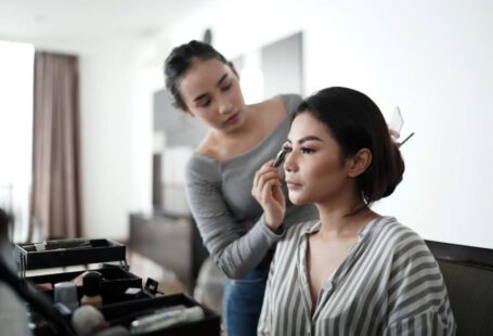 Japanese Cosmetics - woman in gray cardigan holding her face