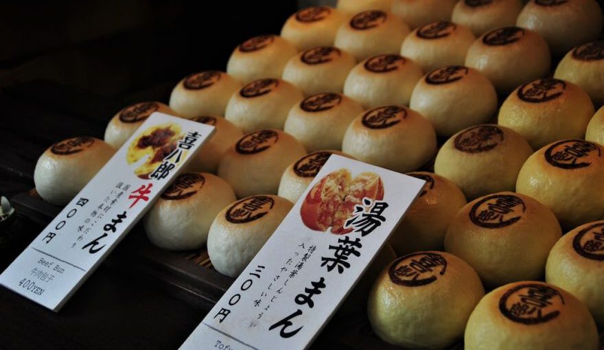 Japanese Snacks - white and brown pastry on display counter