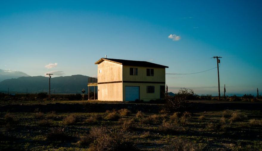 Power Outlets - low-angle photography of house beside street