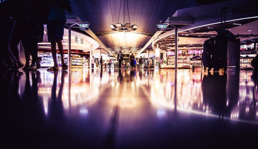 Duty Free - people standing on lighted room